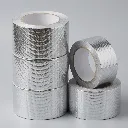reinforced-silver-cloth-duct-tape-stack-bulk-supply.webp